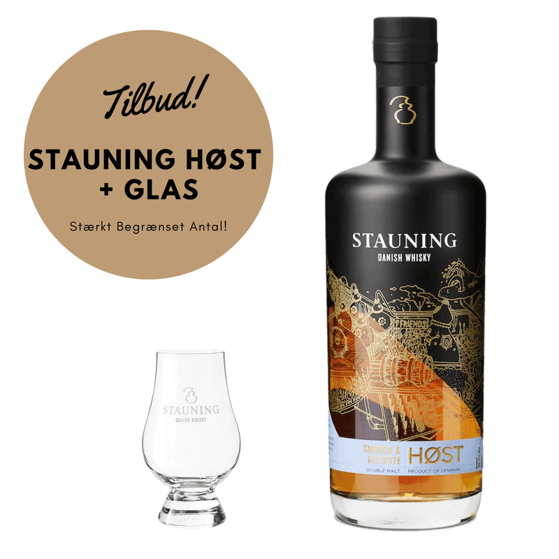 Flaske Stauning Høst med medfølgende Stauning Whiskyglas – dansk whisky med noter af tørrede frugter, krydderier og honning, præsenteret sammen med et elegant whiskyglas.